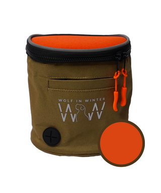Brown dog treat pouch with orange interior and accents, featuring a brand logo on a white background.
