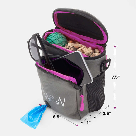 Wolf in Winter dog treat bag with sunglasses and telephone in front pouch, treats and a ball in the main pouch.  It measures 7.5 inches tall by 6.5 inches long.  There is a mesh bag on the side that is 3.5 inches in diameter, and the front pouch is 1 inch.