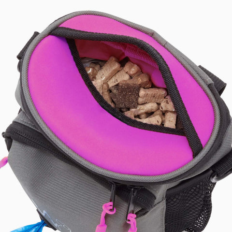 Image of the top of grey Wolf in Winter dog bag, folded open, filled with dog treats